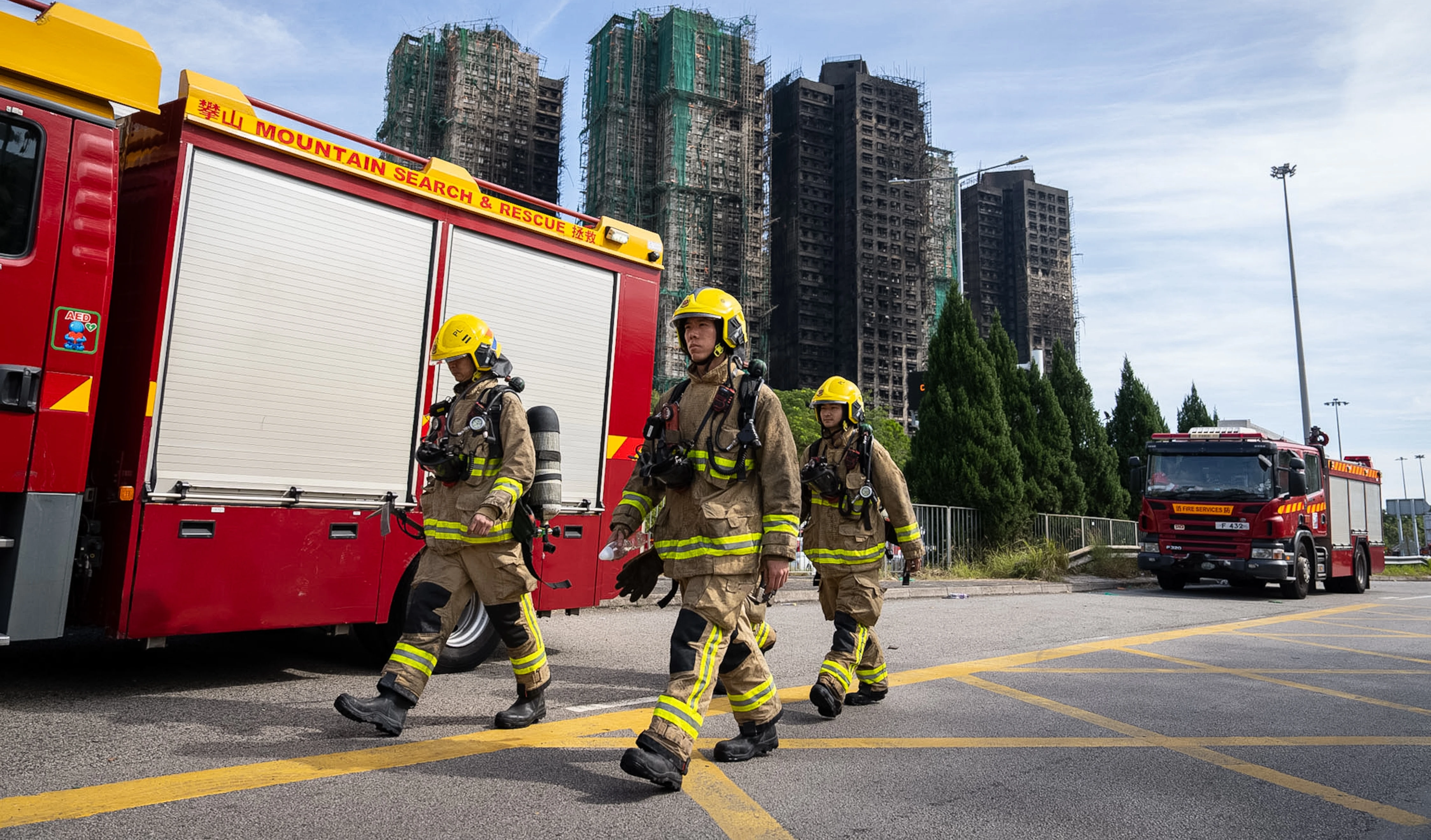 The death toll of a Hong Kong apartment fire rises to 128.