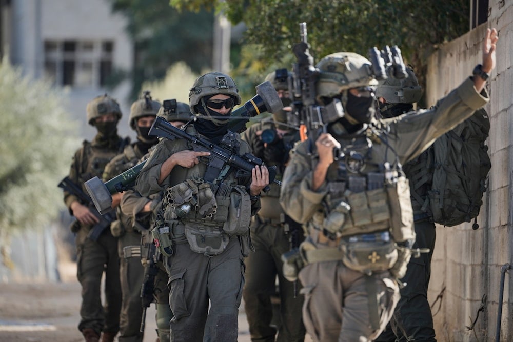 Israeli soldiers are seen during an army raid in the West Bank town of Tubas, Wednesday, Nov. 26, 2025 (AP)