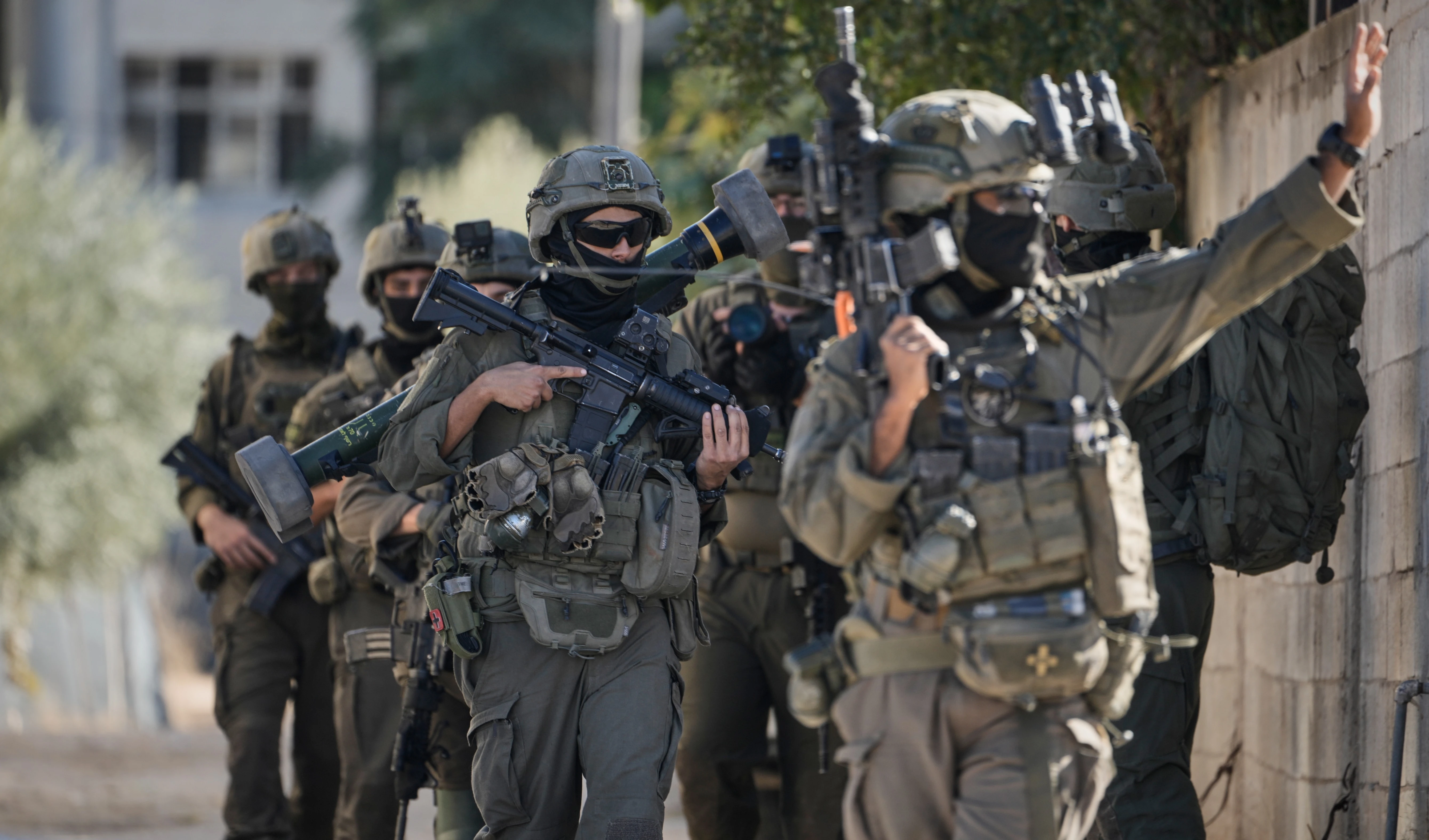 Israeli soldiers are seen during an army raid in the West Bank town of Tubas, Wednesday, Nov. 26, 2025 (AP)