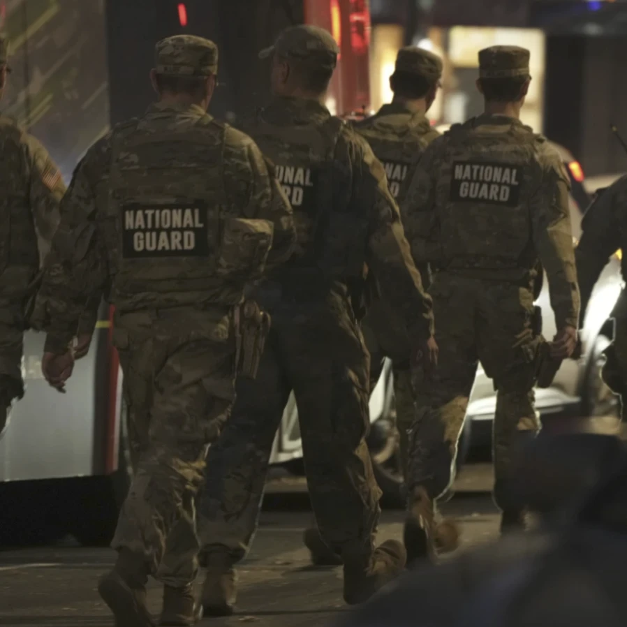 National Guard move through the area following the shooting of two National Guard soldiers near the White House on November 26, 2025 in Washington. (AP)