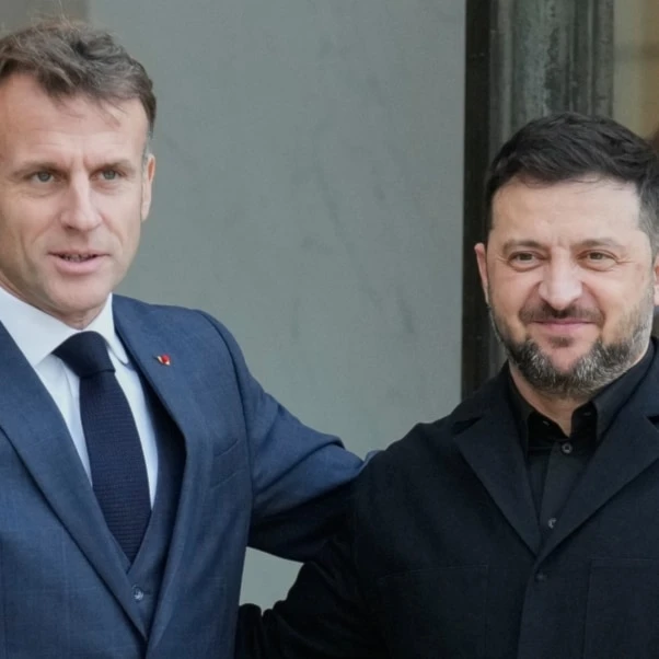 French President Emmanuel Macron, left, welcomes Ukrainian President Volodymyr Zelenskyy, Monday, Nov. 17, 2025 before a joint press conference at the Elysee Palace in Paris. (AP)