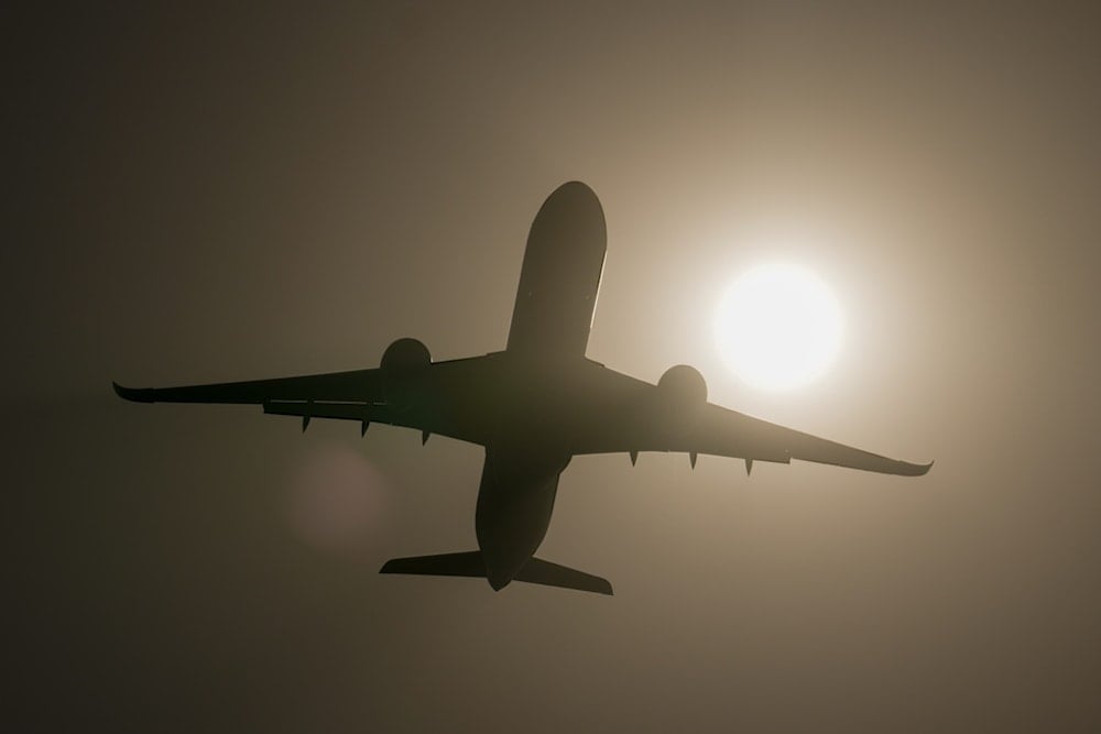 An Airbus A350-1000 is silhouetted against the sun as it performs at the Dubai Air Show, United Arab Emirates, Wednesday, November 19, 2025 (AP)