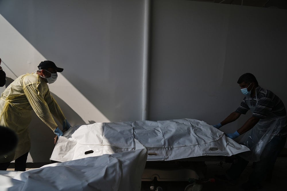 Bodies of unidentified Palestinians returned from Israel as part of the ceasefire deal are brought to Nasser Hospital in Khan Younis, Gaza Strip, Monday, Nov. 3, 2025 (AP)