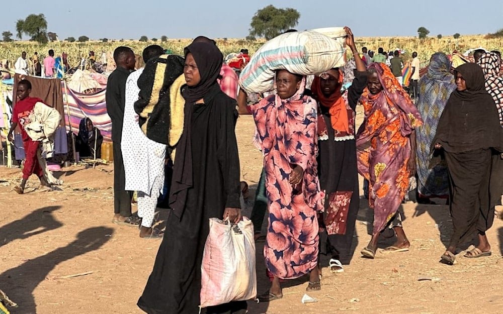 Displaced Sudanese who fled El-Fasher after the city fell to the Rapid Support Forces (RSF), arrive in the town of Tawila in war-torn Sudan's western Darfur region on 28 October, 2025. (AFP)