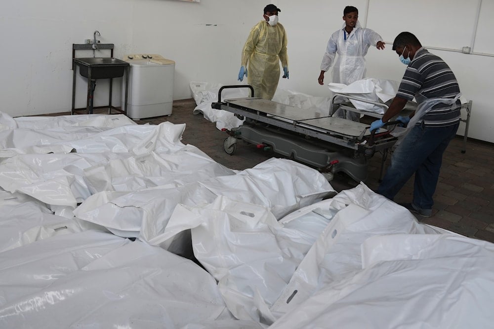 Bodies of unidentified Palestinians returned from Israel as part of the ceasefire deal are brought to Nasser Hospital in Khan Younis, Gaza Strip, on November 3, 2025. (AP Photo/Jehad Alshrafi)