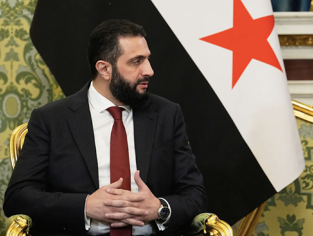 Syrian Interim President Ahmad al-Sharaa speaks during a meeting with Russian President Vladimir Putin at the Grand Kremlin Palace in Moscow, Russia on October 15, 2025. (AP)