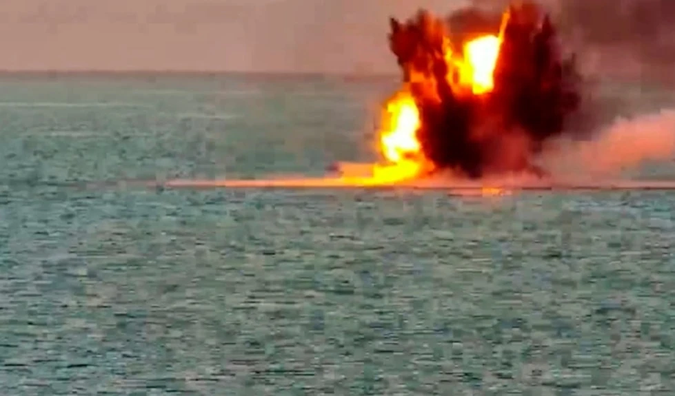 This photo, taken from a video released by the Russian Defense Ministry Press Service on Friday, May 17, 2024, shows the destruction of a Ukrainian sea drone in the Black Sea, Crimea. (AP)