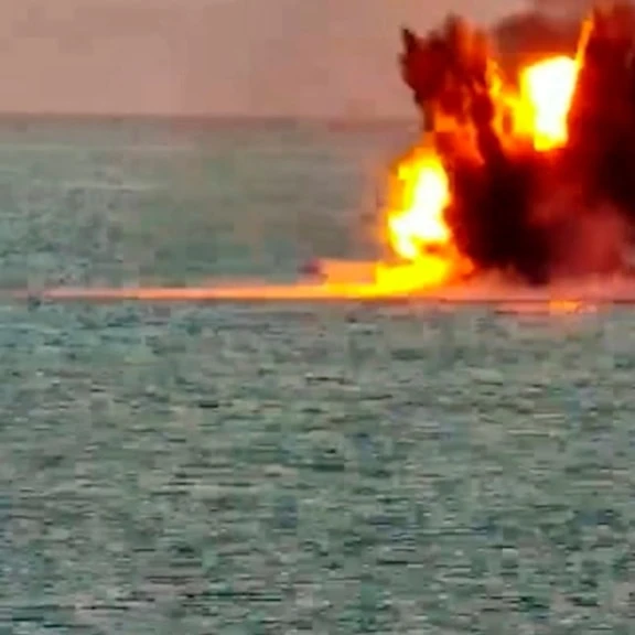 This photo, taken from a video released by the Russian Defense Ministry Press Service on Friday, May 17, 2024, shows the destruction of a Ukrainian sea drone in the Black Sea, Crimea. (AP)