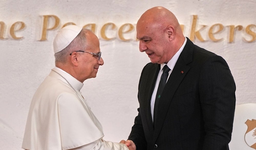 Lebanese President Joseph Aoun, right, shakes hands with Pope Leo XIV as they meet at Beirut's Presidential palace, Lebanon, Sunday, Nov. 30, 2025. (AP)