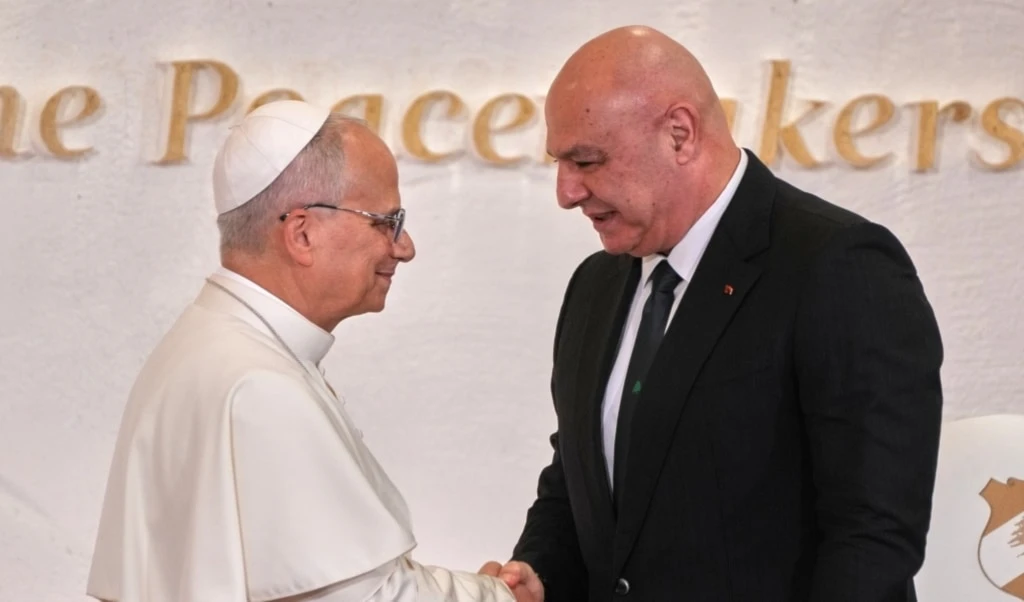 Lebanese President Joseph Aoun, right, shakes hands with Pope Leo XIV as they meet at Beirut's Presidential palace, Lebanon, Sunday, Nov. 30, 2025. (AP)