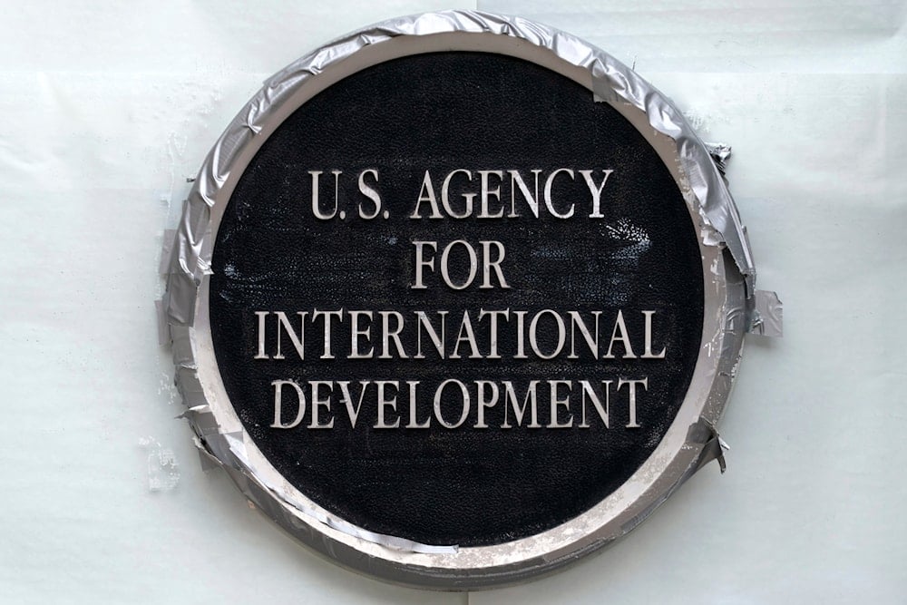 The sign of the former U.S. Agency for International Development is seen at the former building in Washington, Thursday, Feb. 27, 2025 (AP)