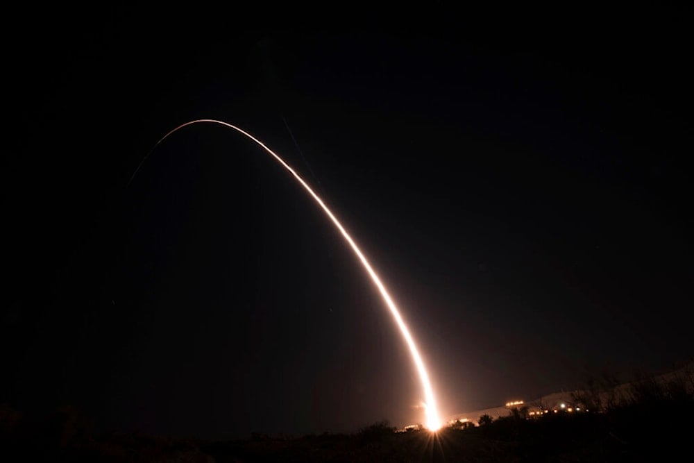 Photo showing an unarmed Minuteman III intercontinental ballistic missile test launch early Tuesday, October 2, 2019, at Vandenberg Air Force Base, California (Michael Peterson/U.S. Air Force via AP)