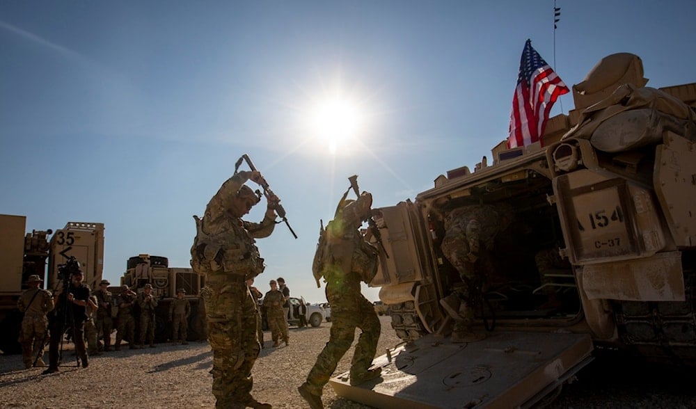  Crewmen enter Bradley fighting vehicles at a US military base at an undisclosed location in Northeastern Syria, on Nov. 11, 2019. (AP)