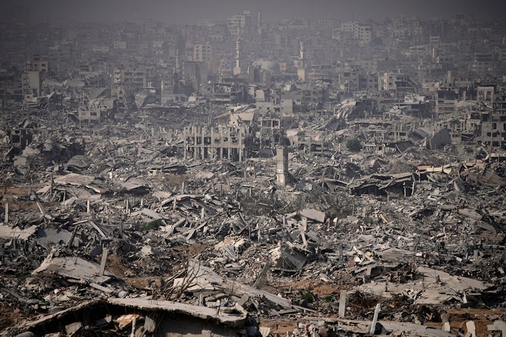 Buildings destroyed by the Israeli military are in ruins in the Shijaiya neighborhood of Gaza City, during an army-organized tour for journalists, Wednesday, November 5, 2025. (AP Photo/Ohad Zwigenberg)