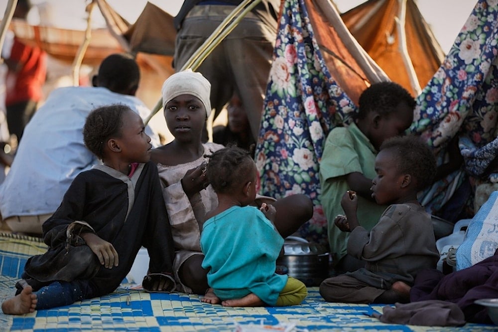 Displaced children and families from el-Fasher at a displacement camp where they sought refuge from fighting between government forces and the RSF, in Tawila, Darfur region, Sudan, Monday, Oct. 27, 2025 (AP)