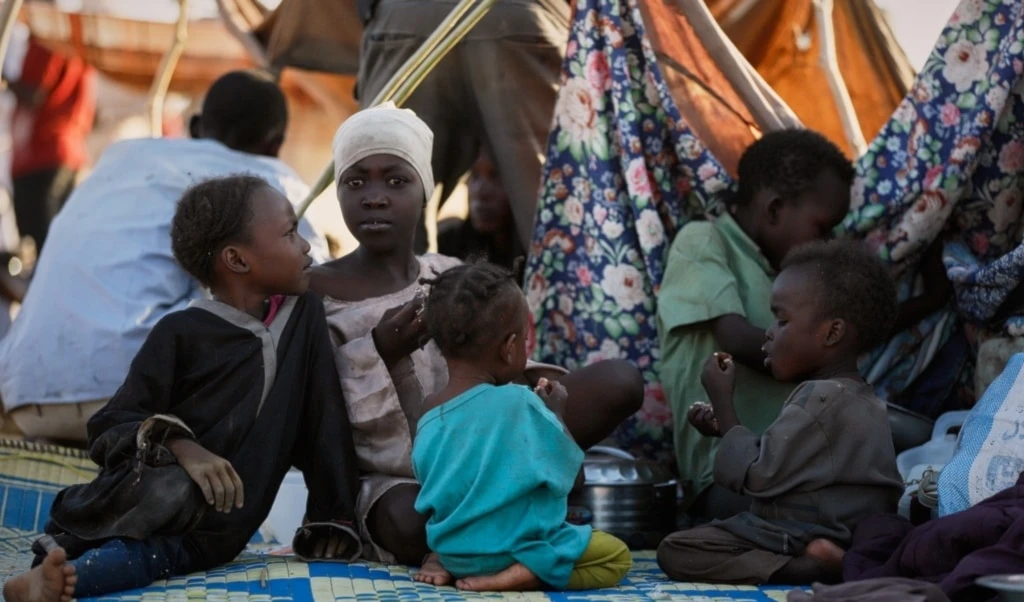 Displaced children and families from el-Fasher at a displacement camp where they sought refuge from fighting between government forces and the RSF, in Tawila, Darfur region, Sudan, Monday, Oct. 27, 2025 (AP)