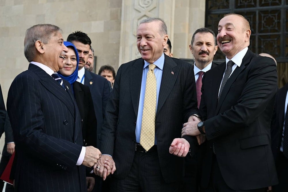 Azebaijan's President Ilham Aliyev, right, Turkey's President Recep Tayyip Erdogan, center, and Pakistan's Prime Minister Muhammad Shehbaz Sharif talk in Baku on Saturday, Nov. 8, 2025 (AP)