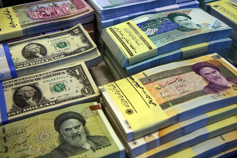 Iran's Guardian Council approves a plan to remove four zeros from its currency.