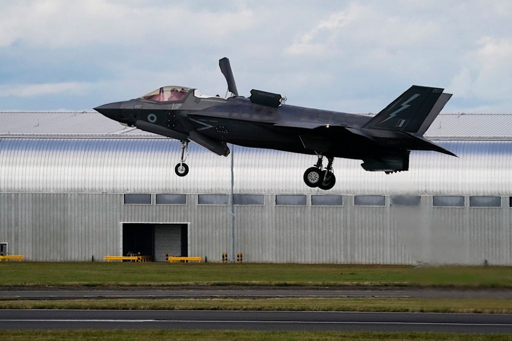 A Royal Air Force F-35 lands at the Farnborough International Air Show in Farnborough, England, on July 22, 2024. (AP Photo/Alberto Pezzali)