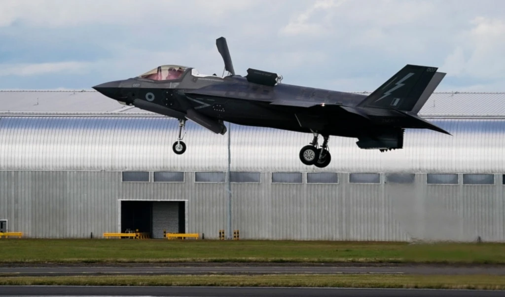 A Royal Air Force F-35 lands at the Farnborough International Air Show in Farnborough, England, on July 22, 2024. (AP Photo/Alberto Pezzali)