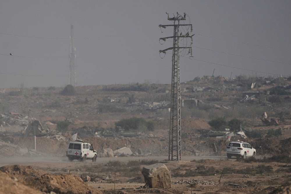 Red Cross convoy carrying what Hamas claims is the remains of an Israeli soldier who was killed in Gaza in 2014 and whose body has been held in Gaza since. makes its way toward the border crossing (AP)