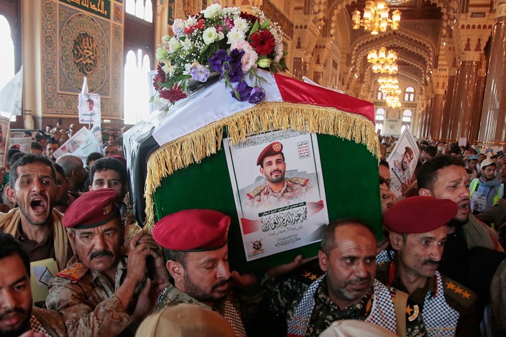 Ansar Allah supporters carry the coffin of Maj. Gen. Muhammad Abdul Karim al-Ghamari, who died of wounds he suffered after an Israeli attack, during his funeral at the people's mosque in Sanaa, Yemen, Monday, Oct. 20, 2025 (AP)