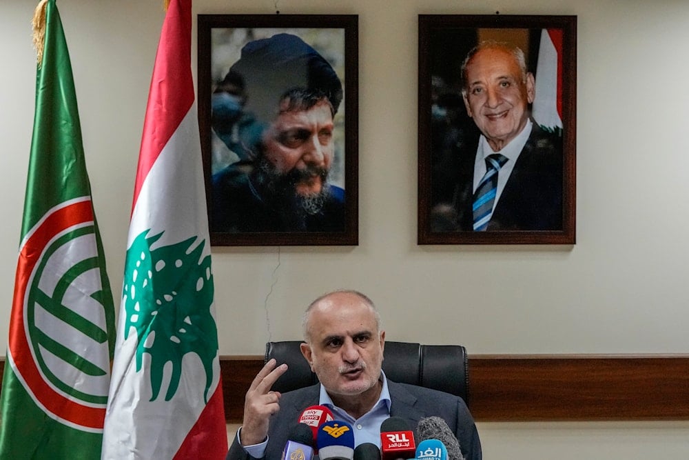 Former Lebanese Finance Minister Ali Hassan Khalil speaks during a press conference in Beirut, Lebanon, Monday, Jan. 3, 2022 (AP)