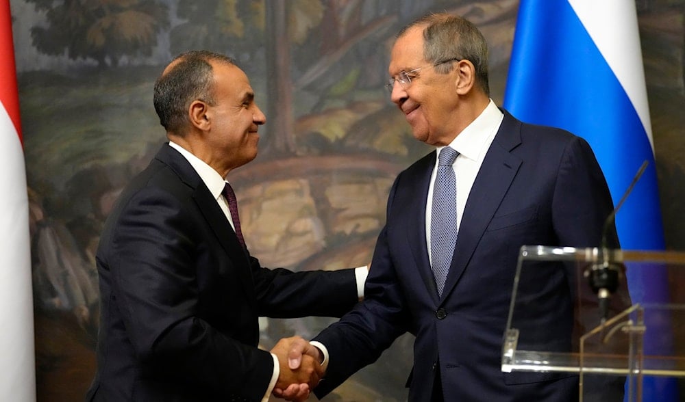 Egypt's Foreign Minister Badr Abdelatty, left, and Russian Foreign Minister Sergey Lavrov shake hands during a news conference following their talks in Moscow, Russi, Sept. 16, 2024. (AP)