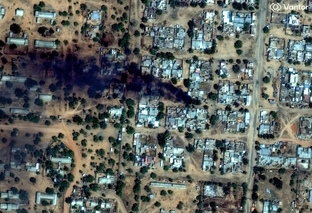 Satellite image provided by Vantor showing buildings on fire near the airport of El-Fasher, Sudan, on October 26, 2025 (AFP)