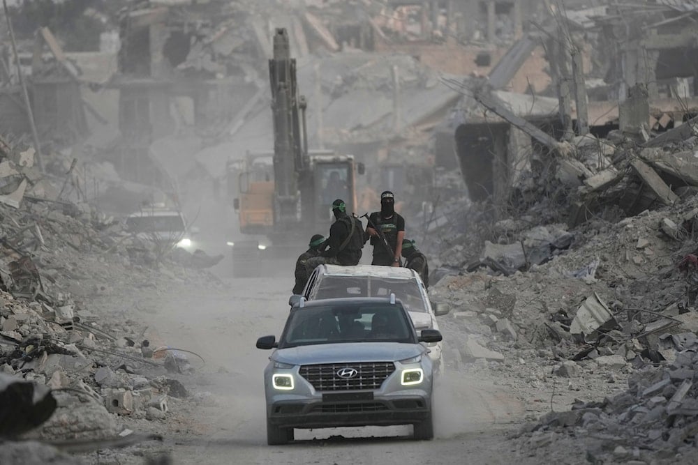 Hamas militants and Egyptian workers search for the bodies of Israeli hostages in the Shijaiyah neighborhood of Gaza City on November 5, 2025. (AP Photo/Jehad Alshrafi)