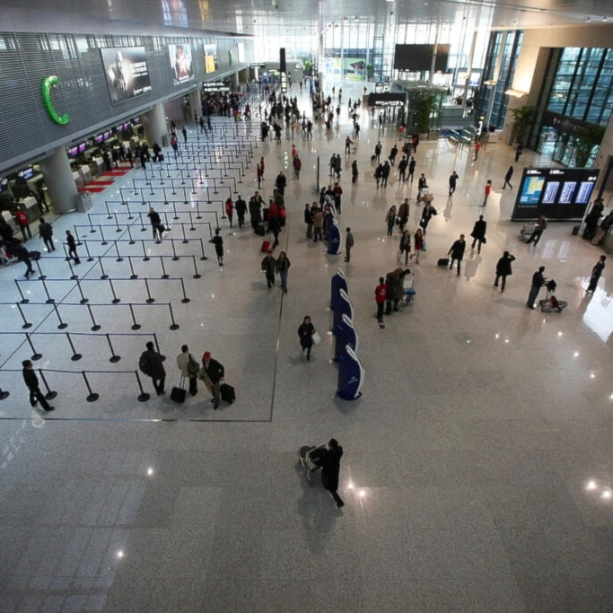 People walk on the departure level floor at Hongqiao Airport's new second terminal Tuesday, March 16, 2010 in Shanghai, China.  (AP)