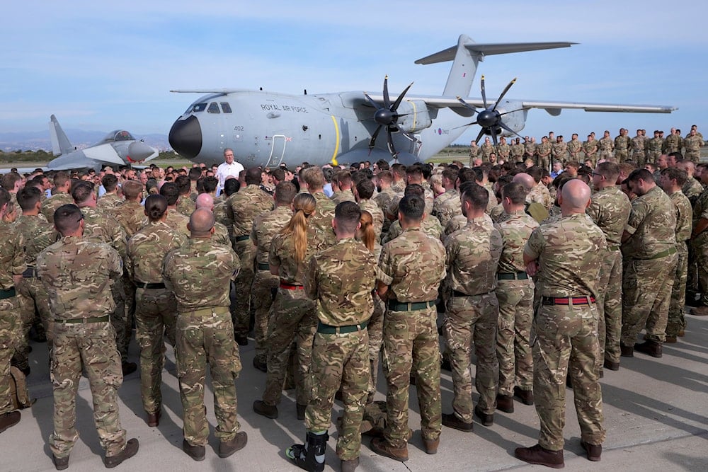Britain's Prime Minister Keir Starmer speaks to soldiers at the RAF base in Akrotiri, Cyprus, Tuesday, Dec. 10, 2024 (AP)