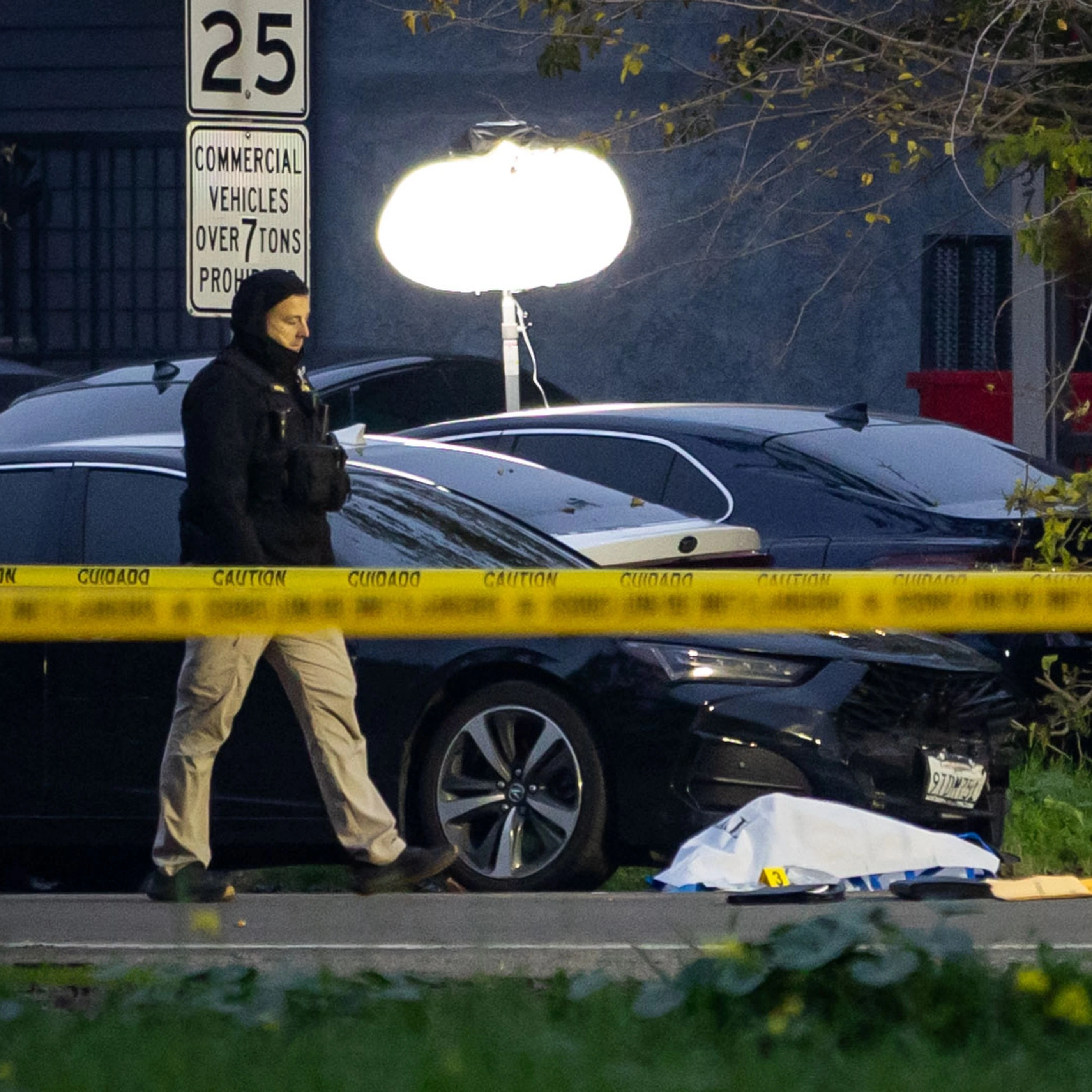 Investigators examine the scene of a mass shooting Sunday, Nov. 30, 2025, in Stockton, California (AP)