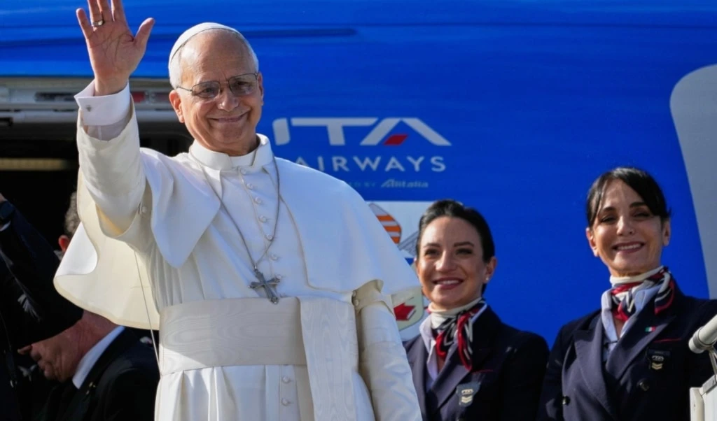 Pope Leo XIV waves as he boards a flight back to the Vatican after his visit to Lebanon at Beirut International Airport in Beirut, Lebanon, Tuesday, December 2, 2025 (AP)