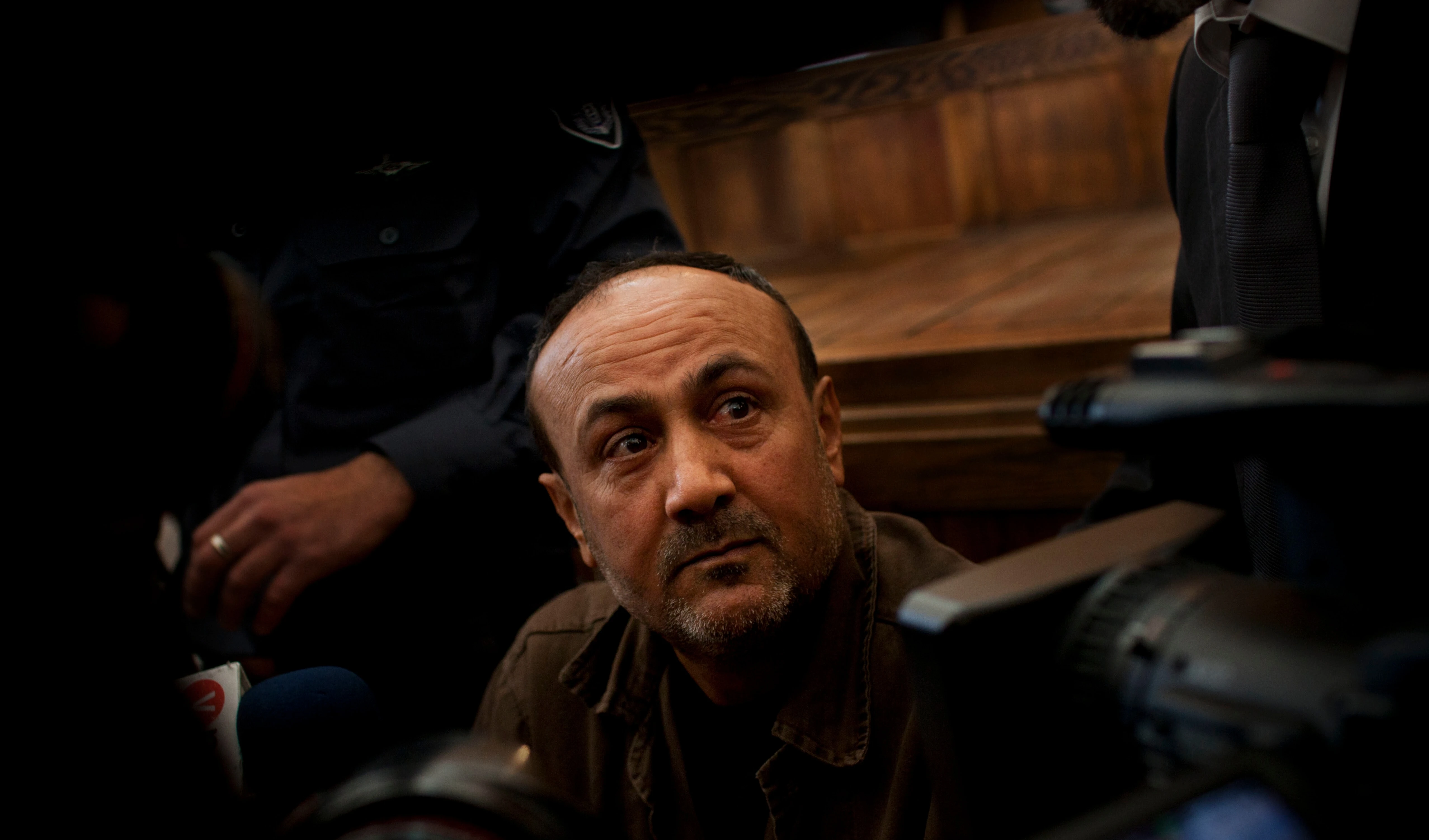 In this Jan. 25, 2012, file photo, senior Fatah leader Marwan Barghouti appears at occupied al-Quds court. (AP Photo/Bernat Armangue, File)