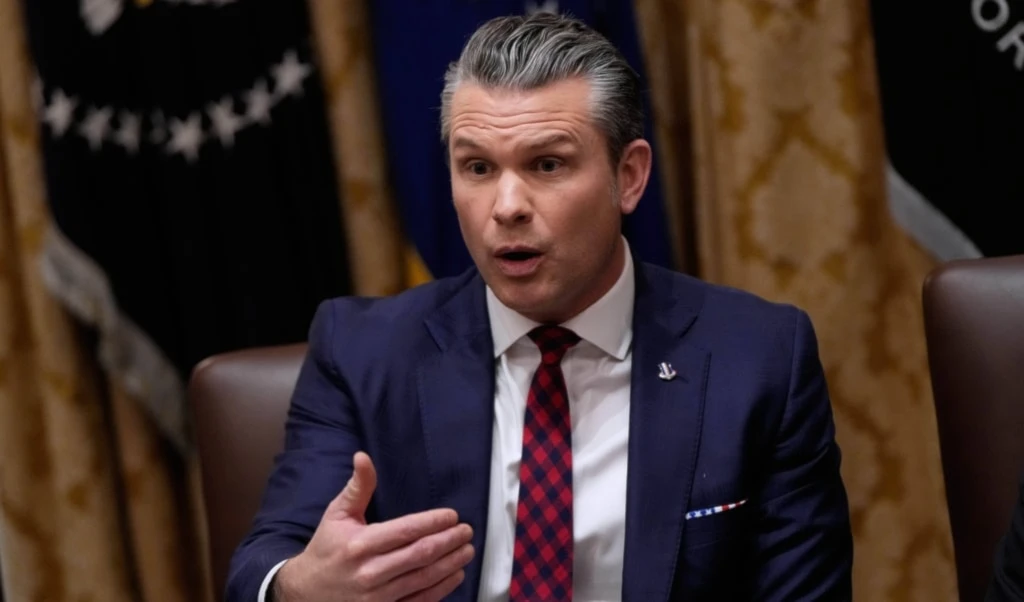 US Defense Secretary Pete Hegseth speaks during a Cabinet meeting at the White House, Tuesday, December 2, 2025, in Washington. (AP Photo/Julia Demaree Nikhinson)