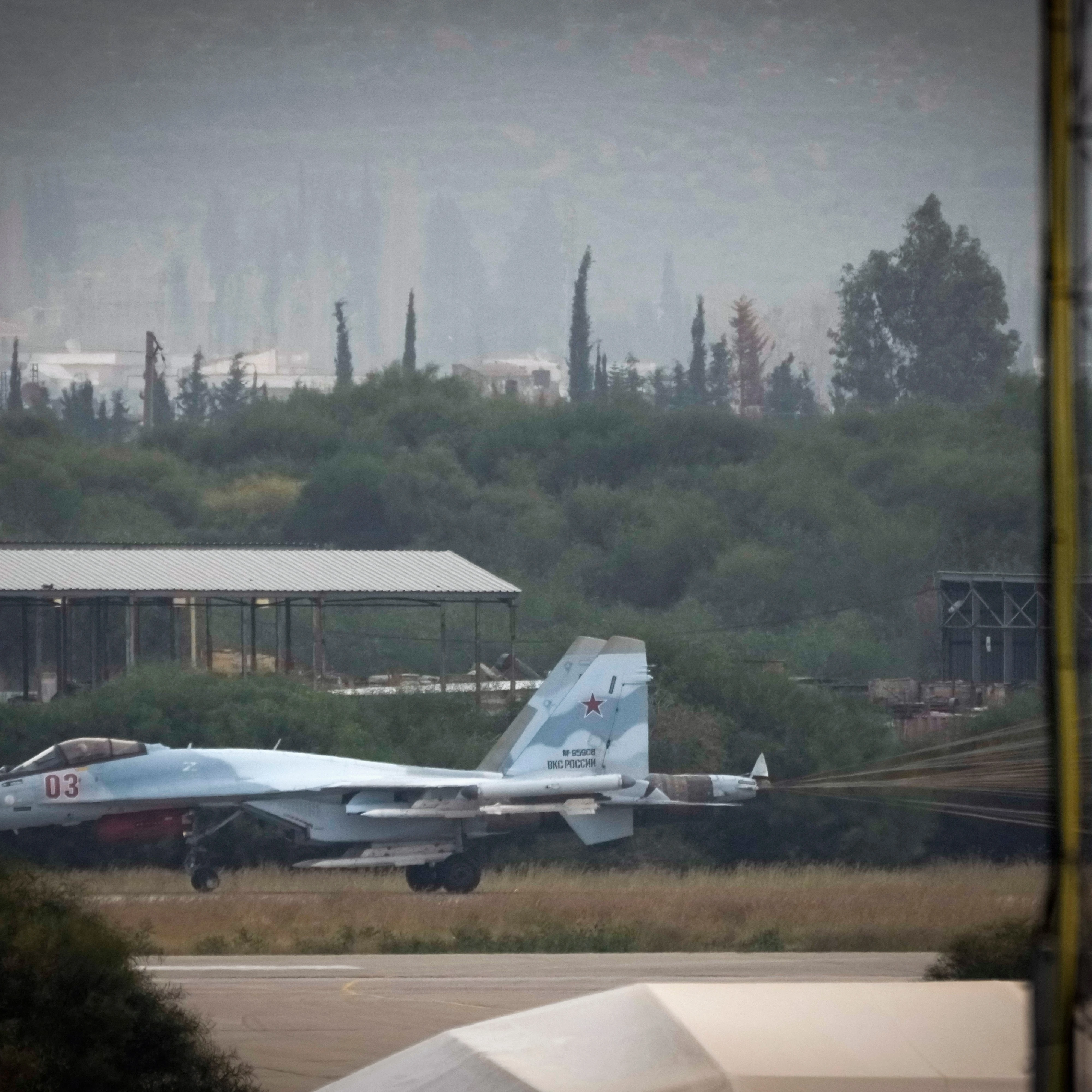 A Russian fighter jet taxi on the tarmac of the Hmeimim Air Base, a Syrian airbase currently operated by Russia, located southeast of the city of Latakia in the town of Hmeimim, Syria, on Monday, Dec.16, 2024 (AP)