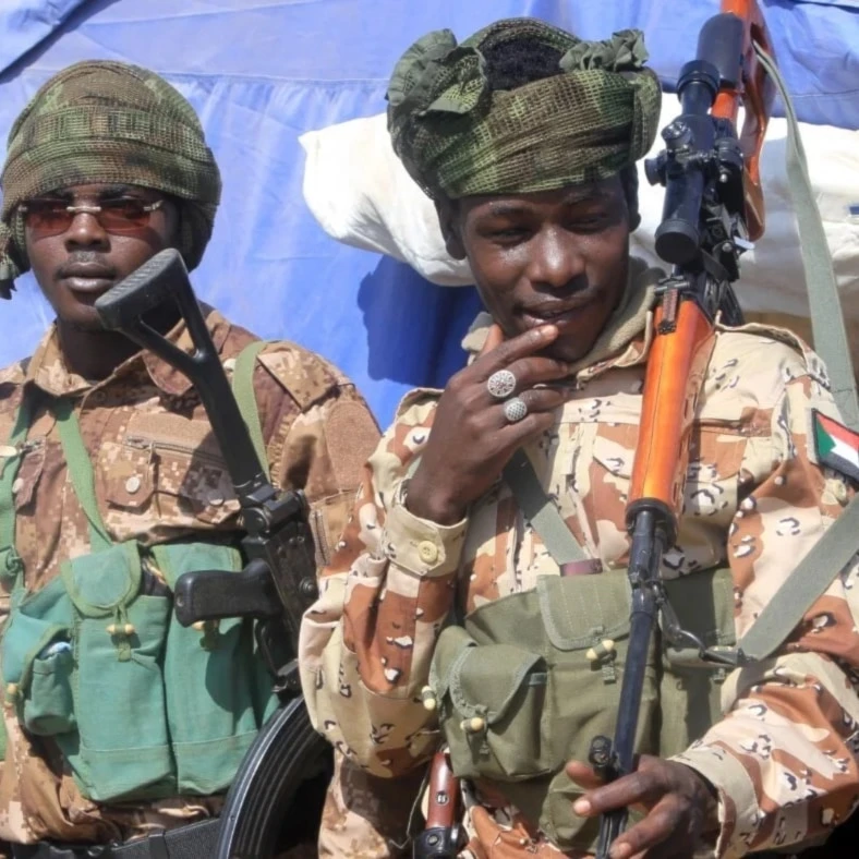 Security at the al-Afad camp for displaced people in the town of al-Dabba, northern Sudan, on 26 November 2025 (AP)