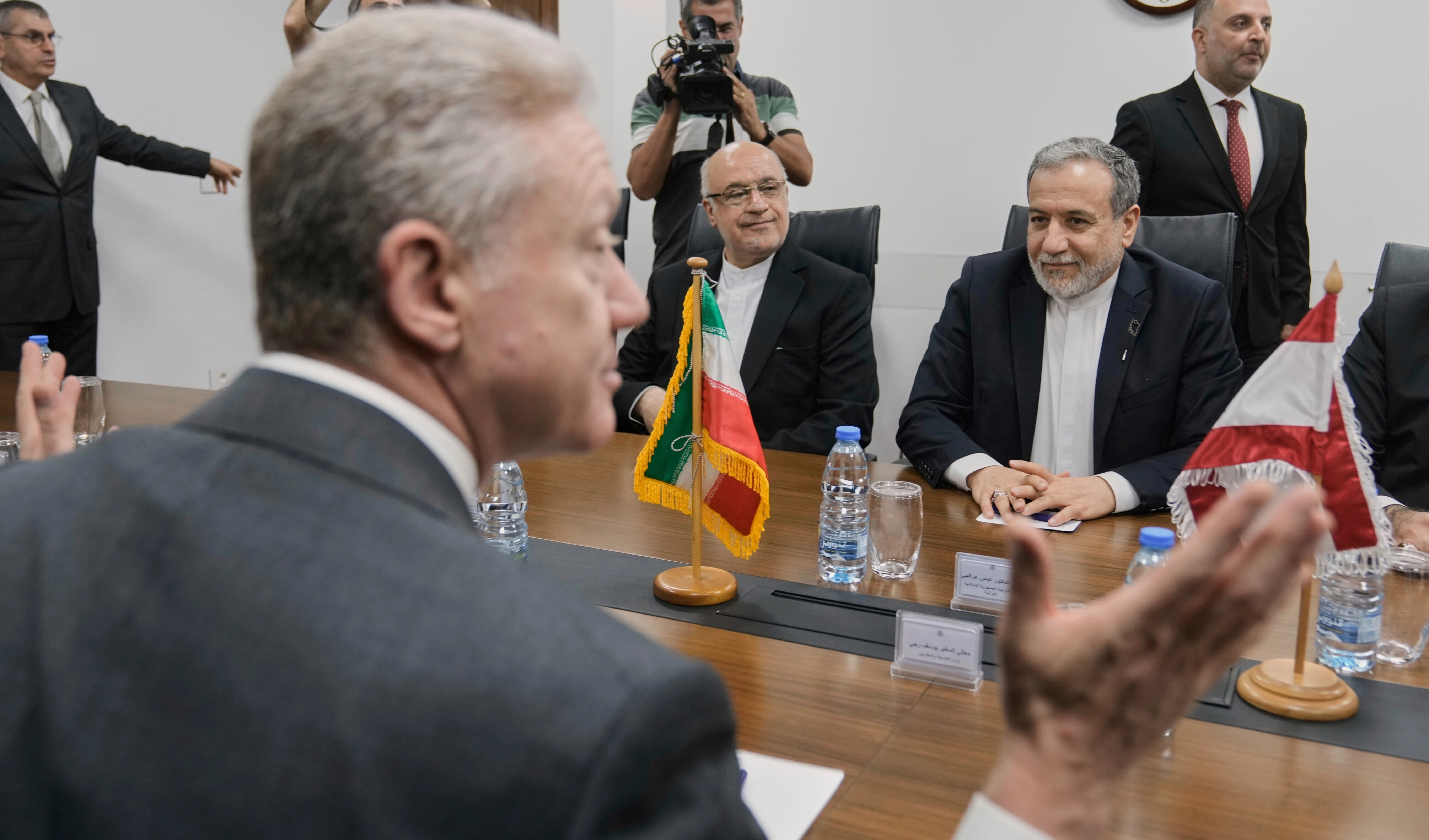Lebanese Foreign Minister Youssef Rajji, foreground, meets with his Iranian counterpart Abbas Araghchi, right, in Beirut, Lebanon, Tuesday, June 3, 2025 (AP)