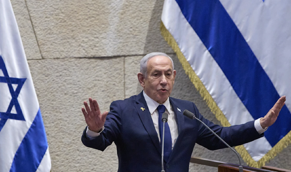 Israeli occupation prime minister Benjamin Netanyahu addresses lawmakers in the Knesset in occupied al-Quds on November 10, 2025. (AP)