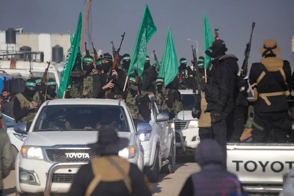 A crowd greets Islamic Jihad and Hamas fighters as they arrive for the handover of Israeli and Thai captives to the Red Cross in the south Gaza Strip town of Khan Younis, Thursday, January 30, 2025. (AP)