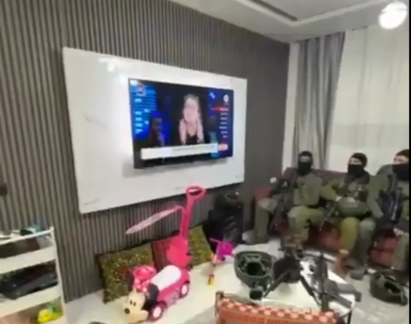 Israeli occupation forces raided a Palestinian home, forcibly displaced its residents with an Israeli journalist and watched his TV show