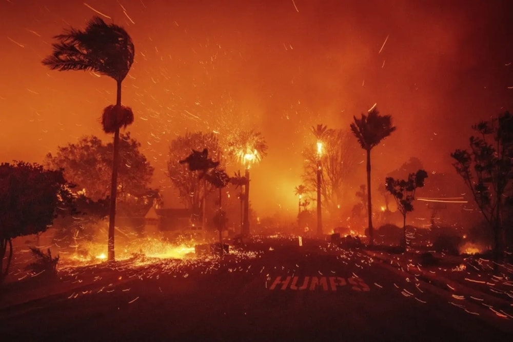 The Palisades Fire ravages a neighborhood amid high winds in Los Angeles, Tuesday, January 7, 2025. (AP)