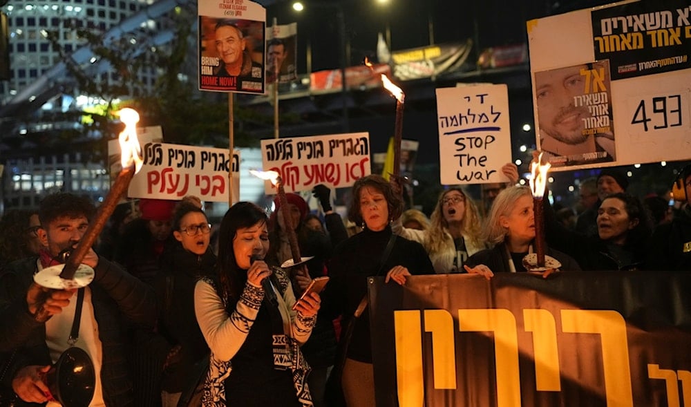 Relatives of Israeli captives protest outside the Israeli Security Ministry Tel Aviv, occupied Palestine, Monday, Feb. 10, 2025 (AP)