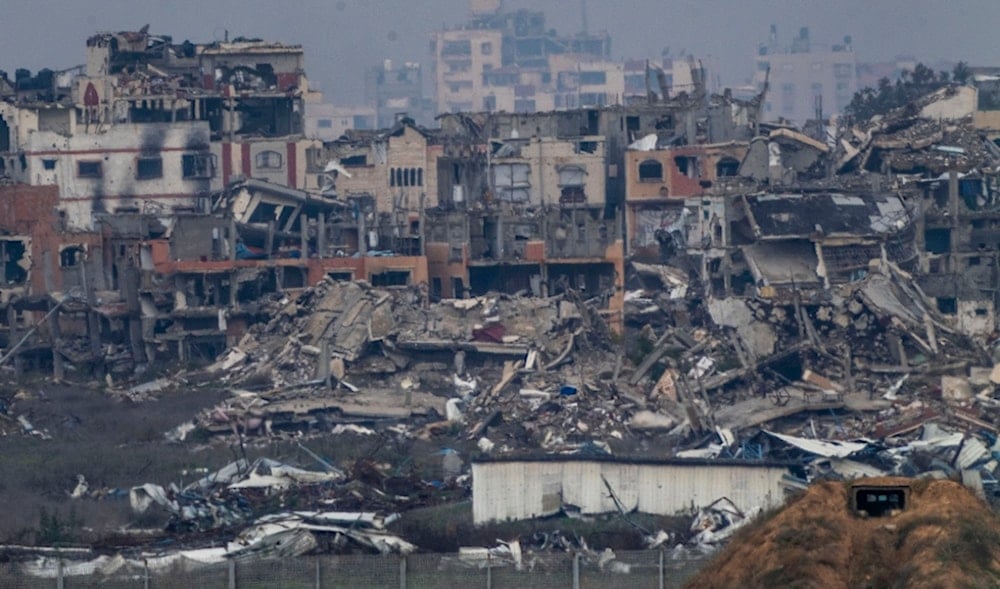 Destroyed buildings by Israeli bombardments inside the northern Gaza Strip as seen from southern occupied Palestine, Tuesday, Feb.11, 2025. (AP)