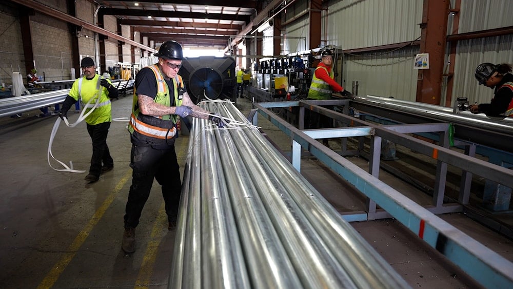 Unimact’s steel line worker preparing critical steel components for solar power generation projects in the southwestern U.S. Jun 18, 2024  (AP)