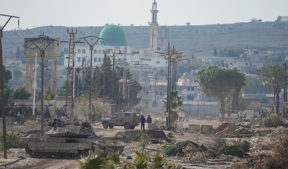 Israeli occupation army armored vehicles block a road leading to the town of Quneitra, Syria, Sunday Jan. 5, 2025.(AP)