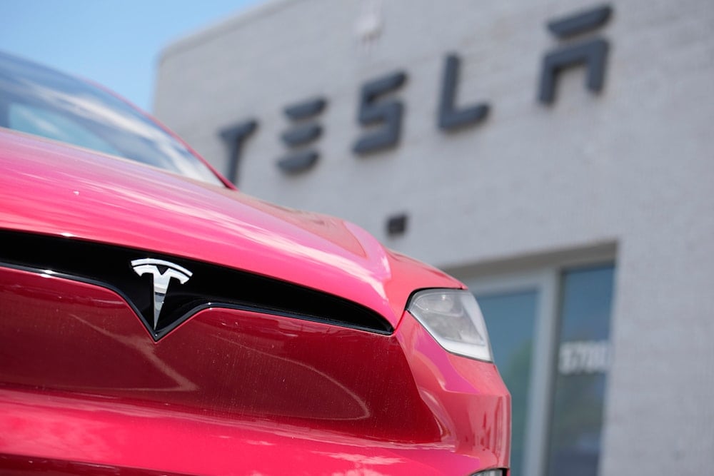 A Model X sports-utility vehicle sits outside a Tesla store in Littleton, Colo., June 18, 2023. (AP)