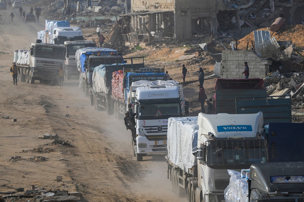 Trucks carrying humanitarian aid enter the Gaza Strip from Egypt in the southern Gaza town of Rafah, Wednesday, Feb. 12, 2025.(AP)