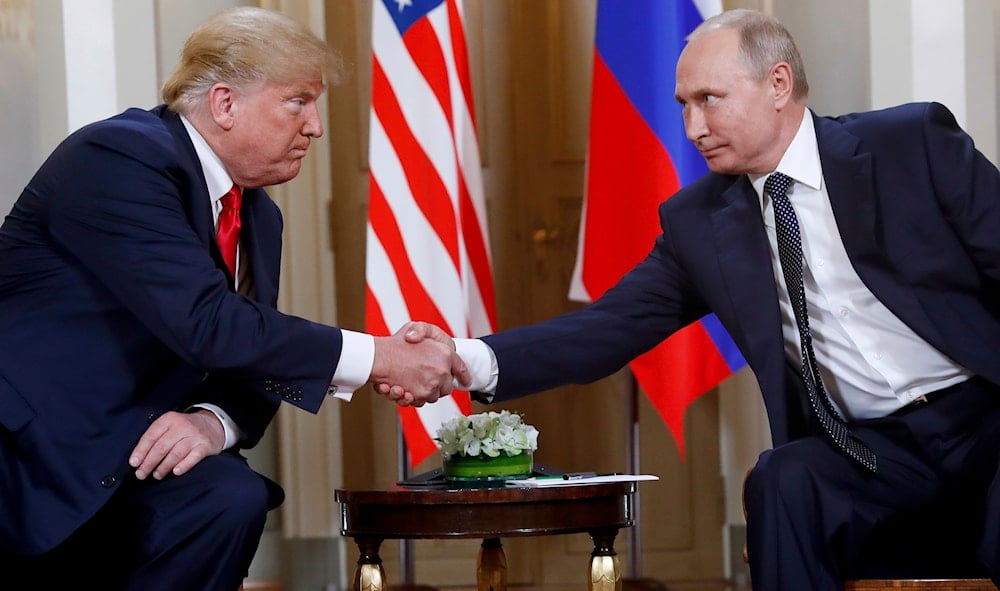 President Donald Trump, left, and Russian President Vladimir Putin shake hands at the beginning of a meeting at the Presidential Palace in Helsinki, Finland, July 16, 2018 (AP)